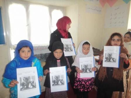 CBE Students looks very happy on receiving of winter activities reference book in Sarband Olia community.JPG